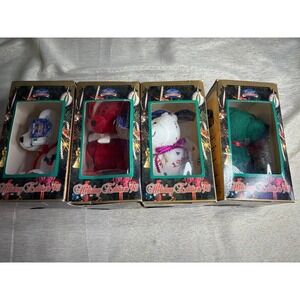 set of four "Limited Treasures Holiday Edition '98" collectible bears New in box